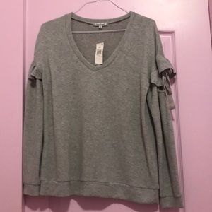 Grey V-neck top sweater with ruffles & bow on arms